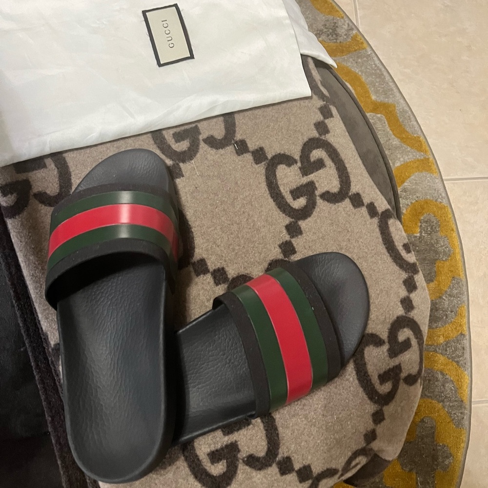 Gently worn authentic Gucci slides with dust bags.  Orig $400